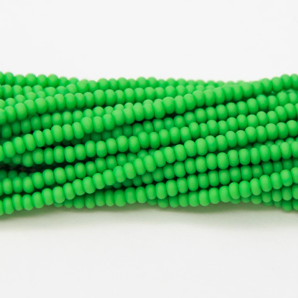 10SB182-MR: CZ Seed Bead Opaque LT Green Matte 10/0 1 Hank - Image 4
