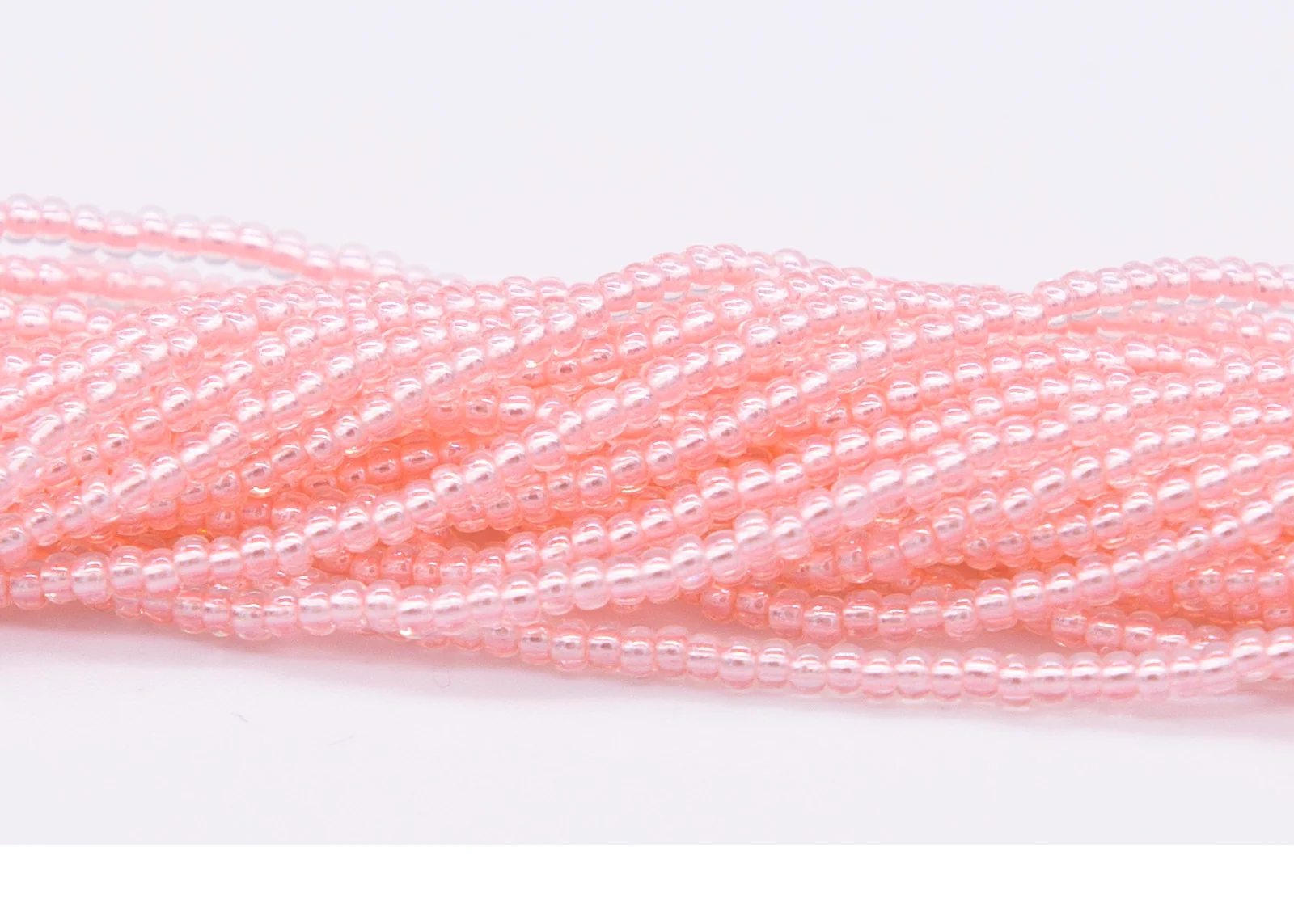 10SB691-LP: CZ Seed Bead Pastel Pearl Lined Pink 10/0 5HK