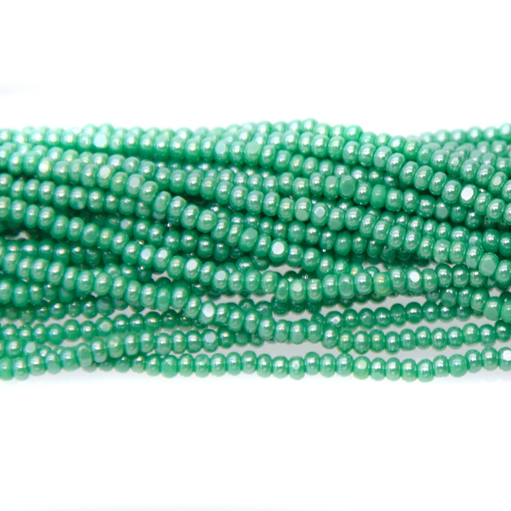 13SB384-CR: CZ Seed Bead Charlotte Sfinx Green 13/0 - 1HK