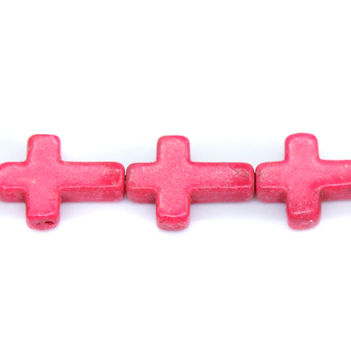 27ST612-P: Magnesite Cross Beads Pink 12x16mm 15.5"