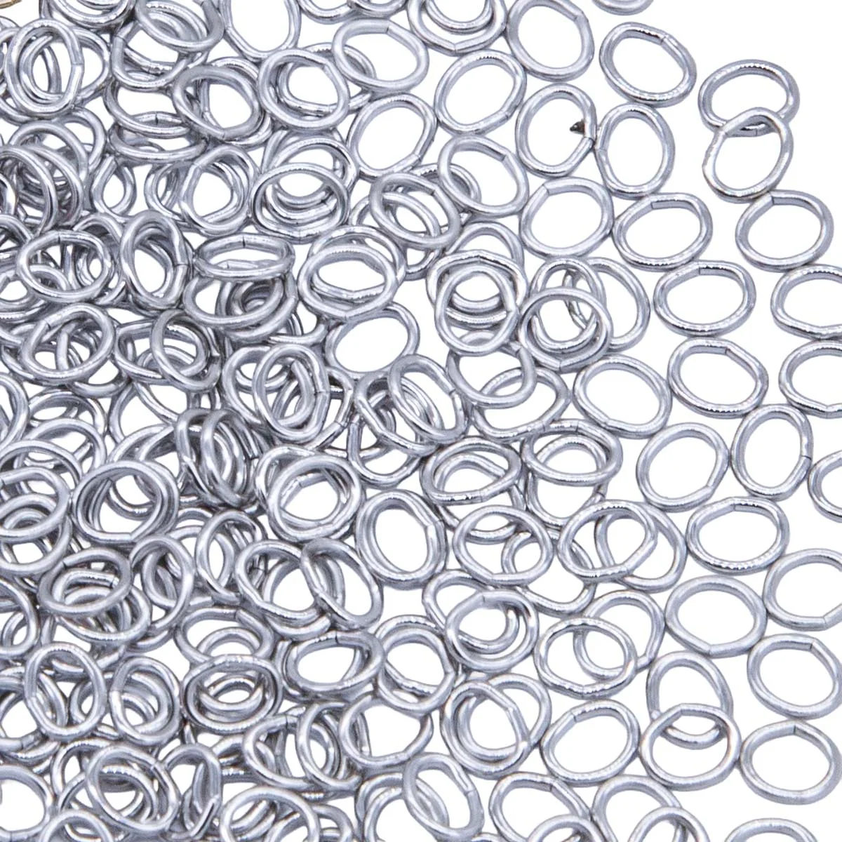 5FI224-IR: USA Made Brass Oval Jump Ring Imitation Rhodium Finish 4.4x5.2mm 21 Gauge 25 Gram