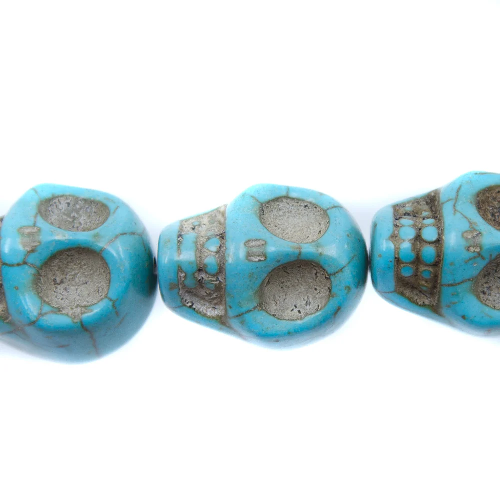 5ST50-B: 23x18mm Blue Magnesite Skull Beads 15.5"