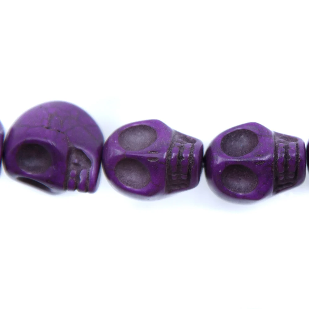 ST50-PR: 18x13mm Purple Magnesite Skull Beads 15.5"