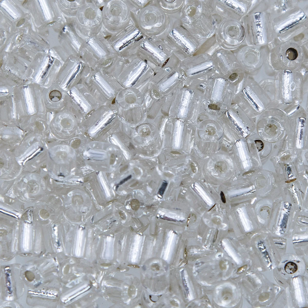 SV100-128: Vintage Venetian Tube Crystal Silverlined 4x5mm - 250 Grams